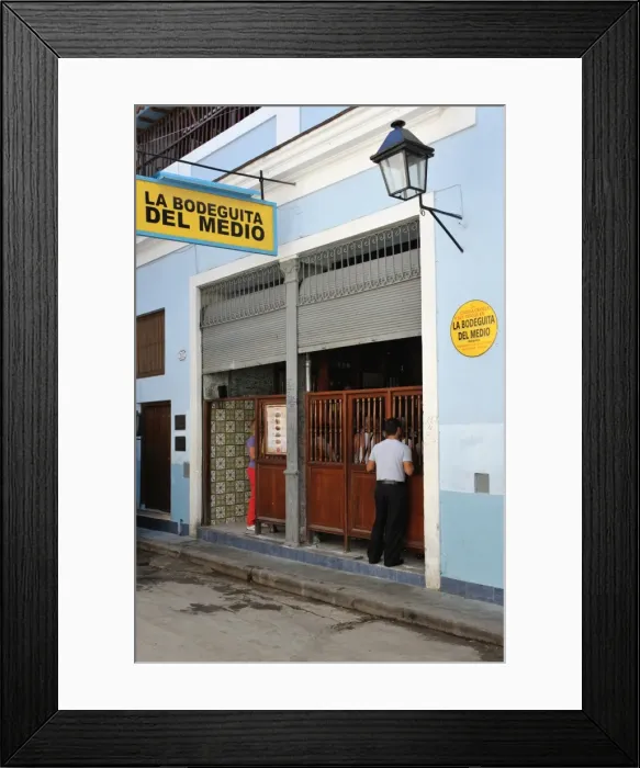 Framed Print : The Bodeguita del Medio, a popular restaurant-bar and music venue, made famous by Ernest Hemingway Framed Print : The Bodeguita del Medio, a popular restaurant-bar and music venue, made famous by Ernest Hemingway
