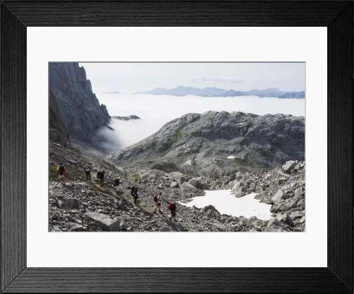 Framed Print : Hikers in the Picos de Europa National Park, shared by the provinces of Asturias