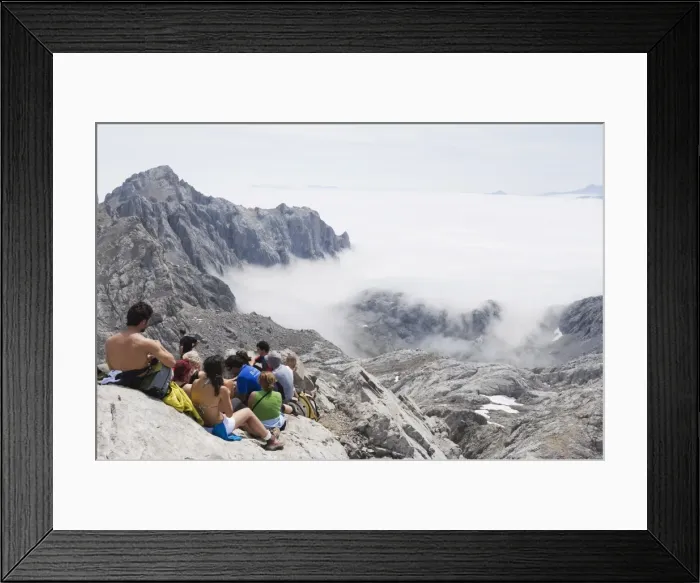 Framed Print : Hikers taking a break on Tesorero Peak, in Picos de Europa National Park Framed Print : Hikers taking a break on Tesorero Peak, in Picos de Europa National Park