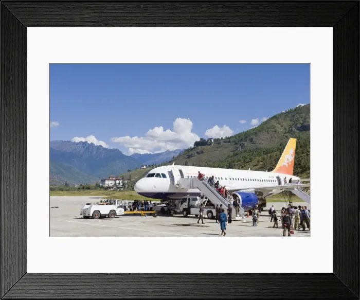Framed Print : Passenger plane at Paro International Airport, Paro Rinpung Dzong in the distance Framed Print : Passenger plane at Paro International Airport, Paro Rinpung Dzong in the distance