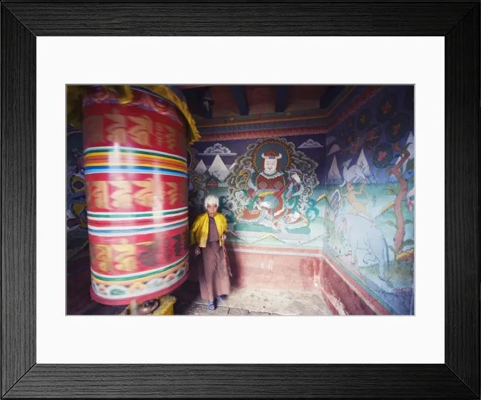 Framed Print : A woman spinning a prayer wheel, Chimi Lhakhang dating from 1499, Temple of the Divine Madman Lama Drukpa Kunley, Punakha Framed Print : A woman spinning a prayer wheel, Chimi Lhakhang dating from 1499, Temple of the Divine Madman Lama Drukpa Kunley, Punakha