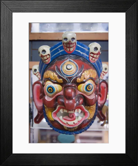 Framed Print : Festival mask in a souvenir shop, Bhutan, Asia Framed Print : Festival mask in a souvenir shop, Bhutan, Asia