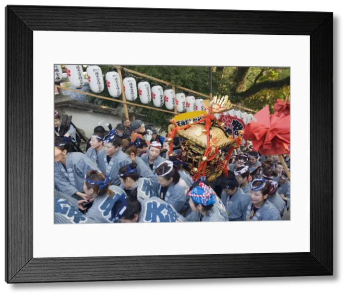 Framed Print : Women carrying a mikoshi portable shrine at Hadaka Matsuri (Naked Festival) Framed Print : Women carrying a mikoshi portable shrine at Hadaka Matsuri (Naked Festival)