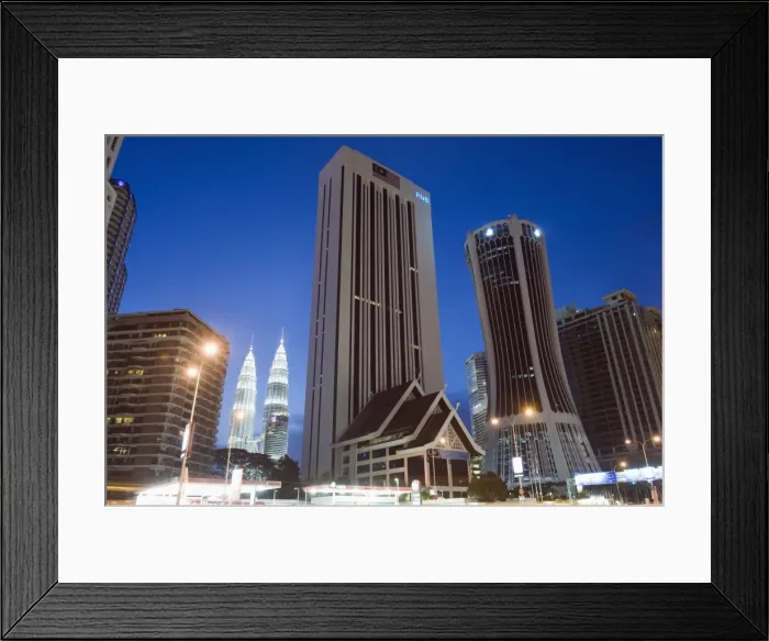 Framed Print : Petronas Towers and Tabung Haji Building, designed by Hijas Katsuri, Kuala Lumpur Framed Print : Petronas Towers and Tabung Haji Building, designed by Hijas Katsuri, Kuala Lumpur