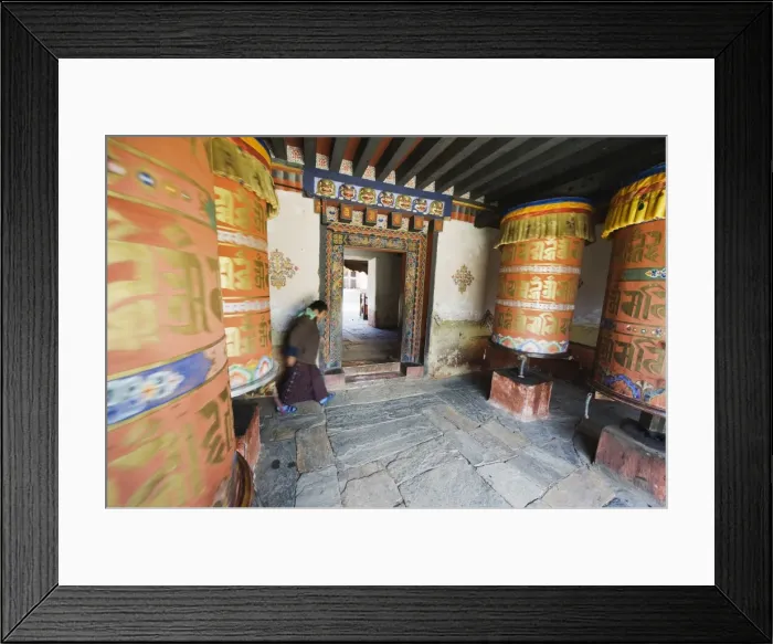 Framed Print : Woman spinning a prayer wheel, Jambay Lhakhang, built 659 by Tibetan King Songtsen Gampo Framed Print : Woman spinning a prayer wheel, Jambay Lhakhang, built 659 by Tibetan King Songtsen Gampo