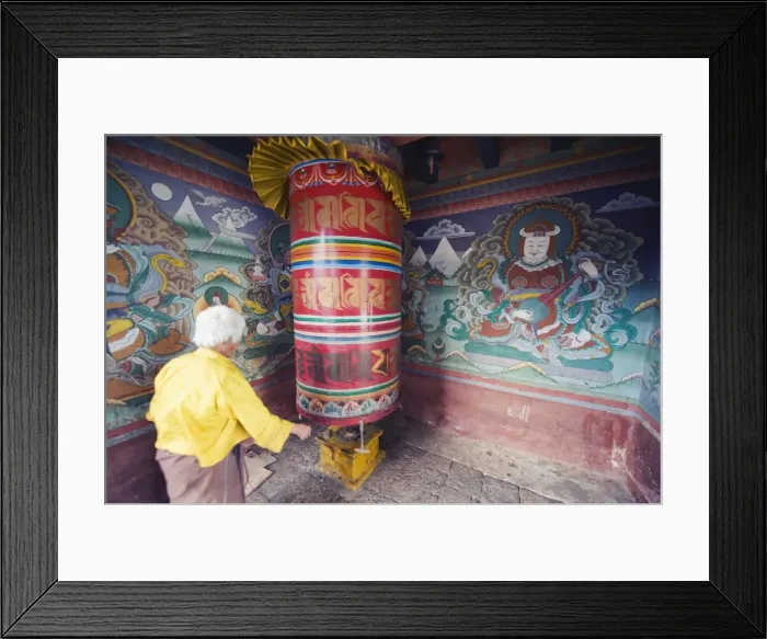 Framed Print : A woman spinning a prayer wheel, Chimi Lhakhang dating from 1499, Temple of the Divine Madman Lama Drukpa Kunley Framed Print : A woman spinning a prayer wheel, Chimi Lhakhang dating from 1499, Temple of the Divine Madman Lama Drukpa Kunley