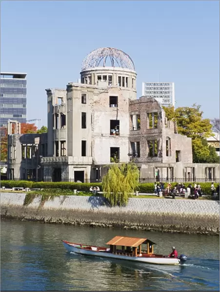 Atomic Bomb Dome, UNESCO World Heritage Site, and boat on Aioi river, Hiroshima