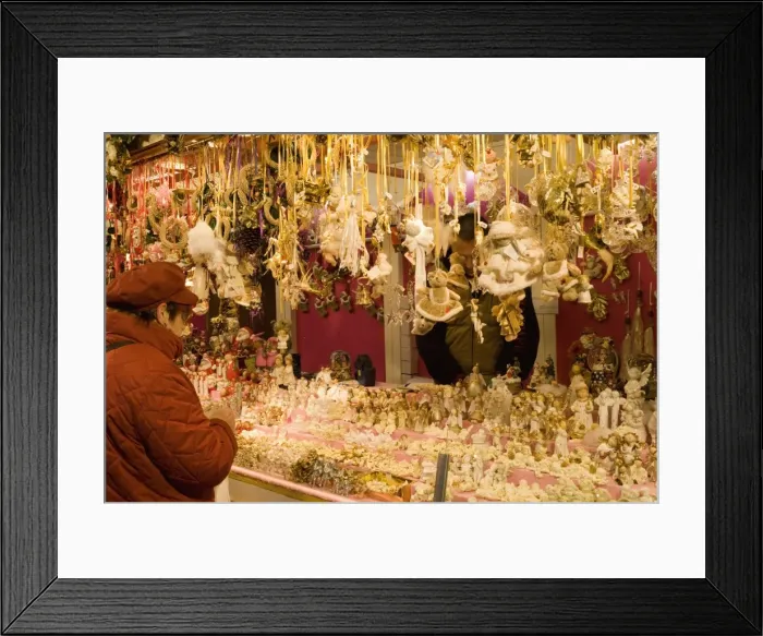 Framed Print : Woman looking at Christmas decorations at stall, Christkindlmarkt (Christmas Market) at Rathausplatz, Innere Stadt, Vienna Framed Print : Woman looking at Christmas decorations at stall, Christkindlmarkt (Christmas Market) at Rathausplatz, Innere Stadt, Vienna