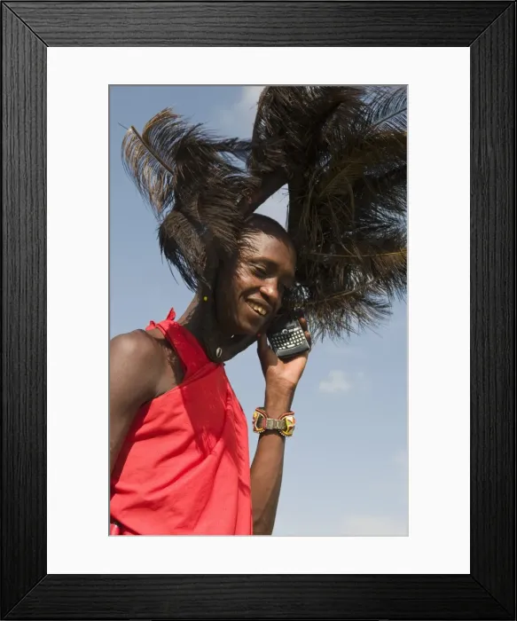 Framed Print : Masai man talking on mobile phone, Masai Mara, Kenya, East Africa, Africa Framed Print : Masai man talking on mobile phone, Masai Mara, Kenya, East Africa, Africa