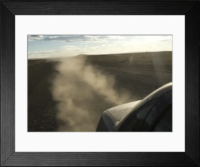 Framed Print : Dust kicks up from behind of car in Patagonia, on the infamous Route 40 Framed Print : Dust kicks up from behind of car in Patagonia, on the infamous Route 40