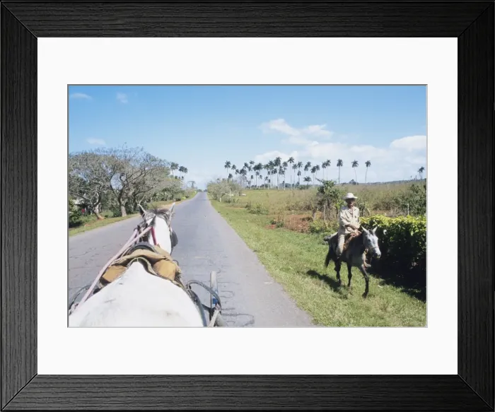 Framed Print : Horse carriage passes farmer on horseback, Vinales, Pinar del Rio, Cuba Framed Print : Horse carriage passes farmer on horseback, Vinales, Pinar del Rio, Cuba