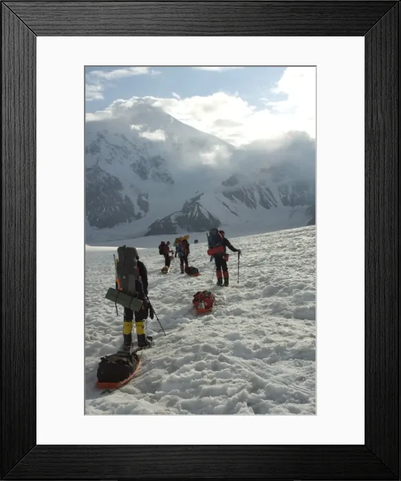 Framed Print : Hikers break with Mount Foraker on the left and Mount Crosson on the right Framed Print : Hikers break with Mount Foraker on the left and Mount Crosson on the right