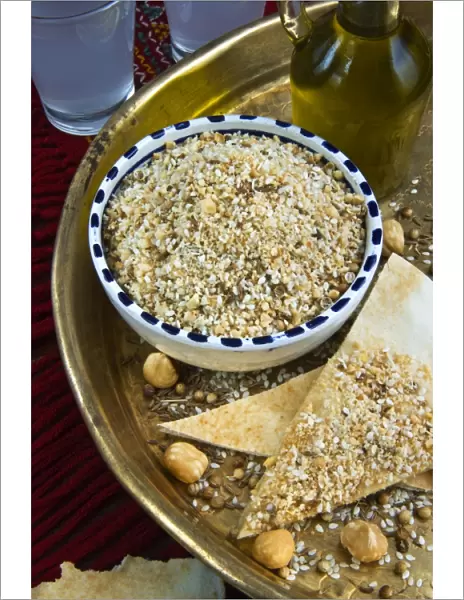 Dukkah (dokka), dry mixture of chopped nuts, seeds and arabic spices and flavors