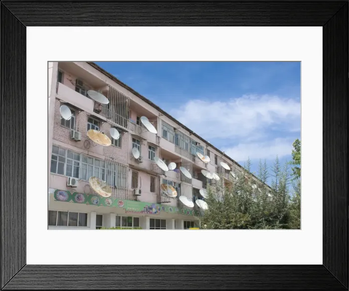 Framed Print : House block in the old Soviet style with satellite dishes, Ashgabad, Turkmenistan Framed Print : House block in the old Soviet style with satellite dishes, Ashgabad, Turkmenistan