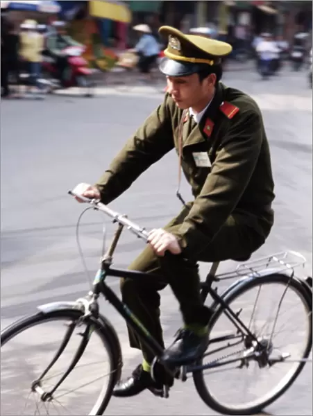 Soldier on bicycle, Hanoi, Vietnam, Indochina, Southeast Asia, Asia