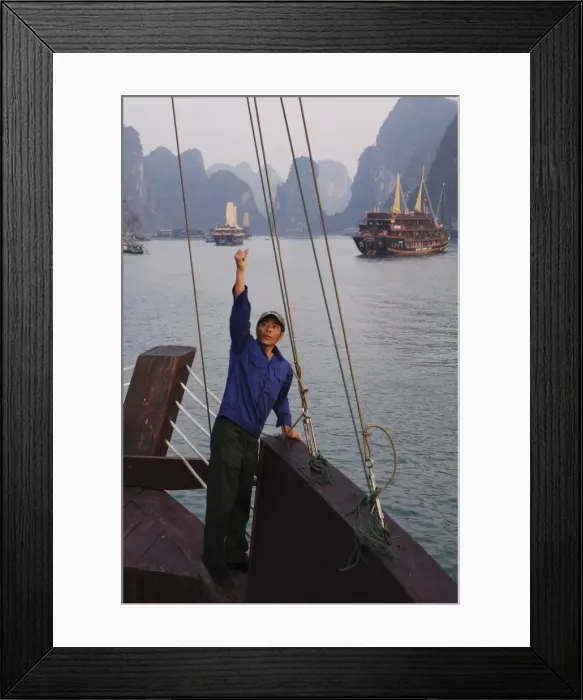 Framed Print : Crewman raises anchor on junk Ha Long Bay, Vietnam, Indochina, Southeast Asia, Asia Framed Print : Crewman raises anchor on junk Ha Long Bay, Vietnam, Indochina, Southeast Asia, Asia