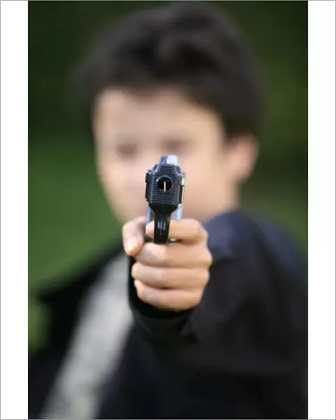 Boy with toy gun, Le Souillard, Eure, France, Europe