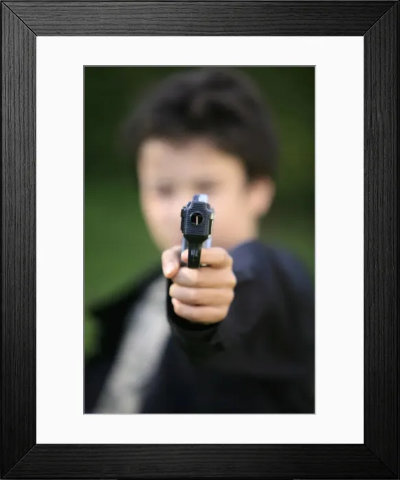 Framed Print : Boy with toy gun, Le Souillard, Eure, France, Europe Framed Print : Boy with toy gun, Le Souillard, Eure, France, Europe