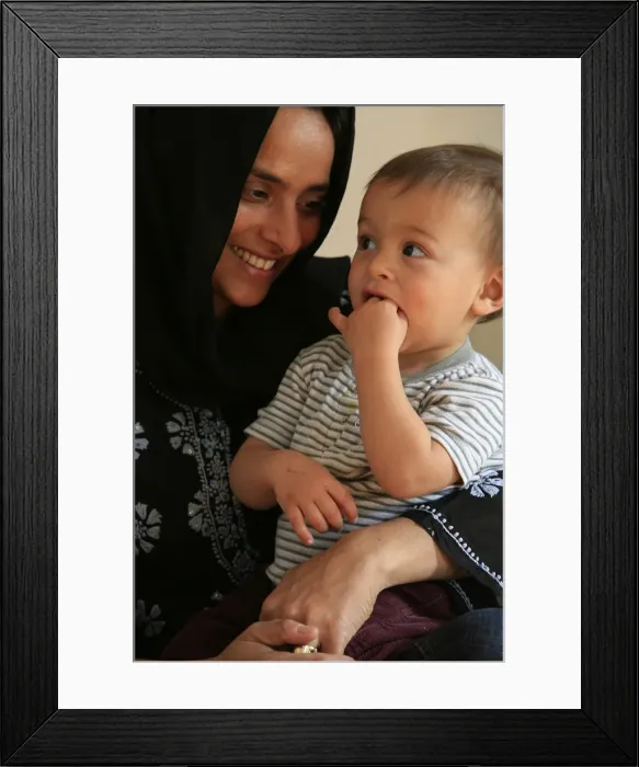 Framed Print : Veiled Muslim woman and child, France, Europe Framed Print : Veiled Muslim woman and child, France, Europe