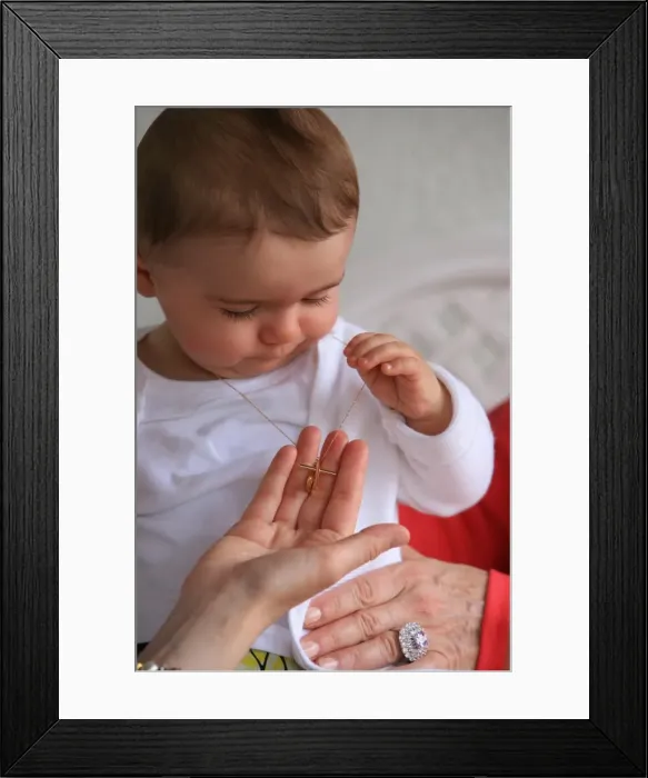 Framed Print : Baptised boy, France, Europe Framed Print : Baptised boy, France, Europe