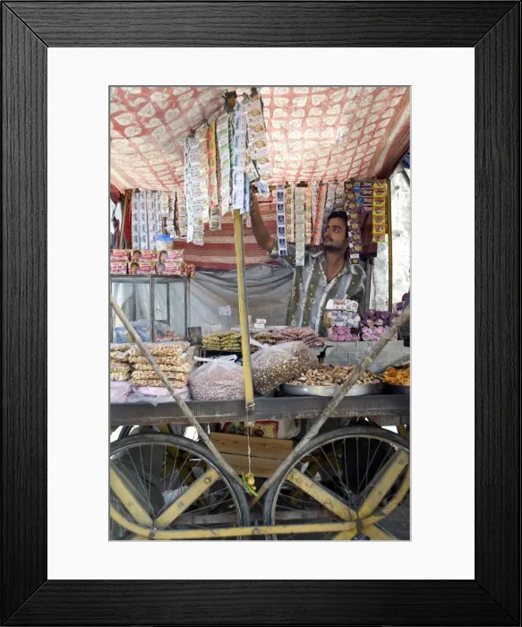 Framed Print : Stall holder selling gutka, namkeen snacks and bidi cigarettes, Kishangarh Framed Print : Stall holder selling gutka, namkeen snacks and bidi cigarettes, Kishangarh
