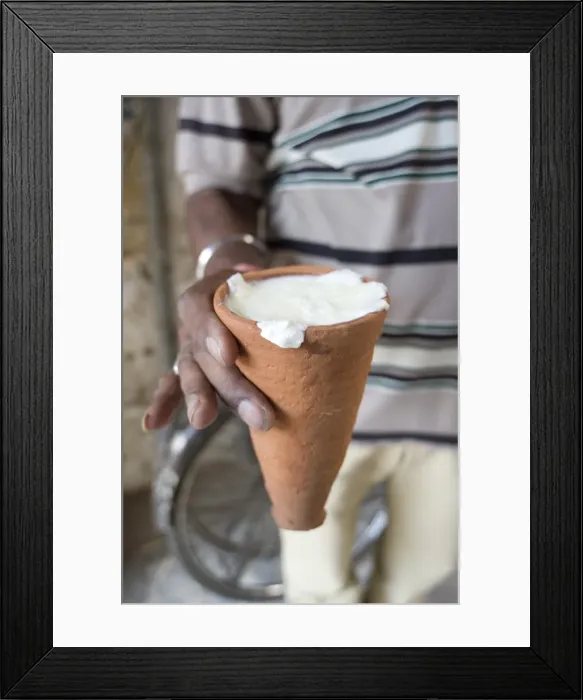 Framed Print : Lassi, Indian yoghourt drink, in disposable and recyclable terracotta cup from the Lassiwallah Framed Print : Lassi, Indian yoghourt drink, in disposable and recyclable terracotta cup from the Lassiwallah