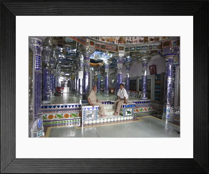 Framed Print : Two men sitting in ornately decorated Jain temple in backstreet, Udaipur Framed Print : Two men sitting in ornately decorated Jain temple in backstreet, Udaipur