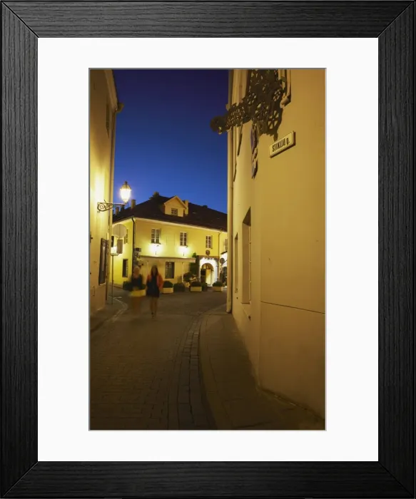 Framed Print : Two women walking along Stikliu Gatve at dusk, Vilnius, Lithuania, Baltic States, Europe Framed Print : Two women walking along Stikliu Gatve at dusk, Vilnius, Lithuania, Baltic States, Europe
