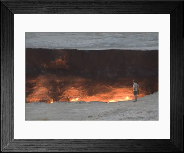 Framed Print : Tourist standing on the edge of the Darvaza Gas crater, Turkmenistan, Central Asia, Asia Framed Print : Tourist standing on the edge of the Darvaza Gas crater, Turkmenistan, Central Asia, Asia