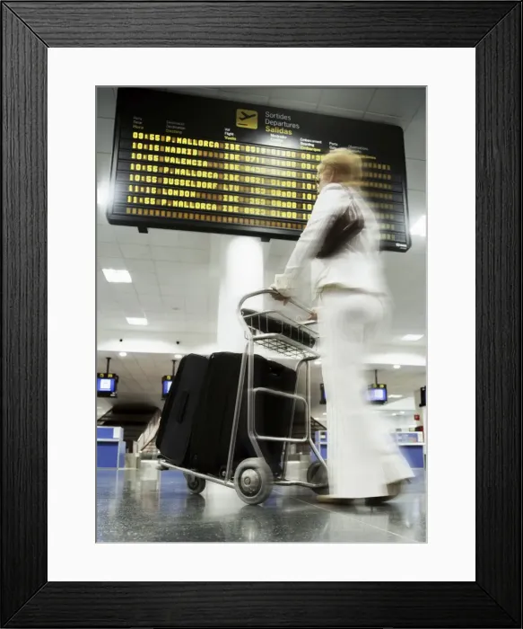 Framed Print : Woman with baggage trolley in departures, Ibiza Airport, Spain, Europe Framed Print : Woman with baggage trolley in departures, Ibiza Airport, Spain, Europe