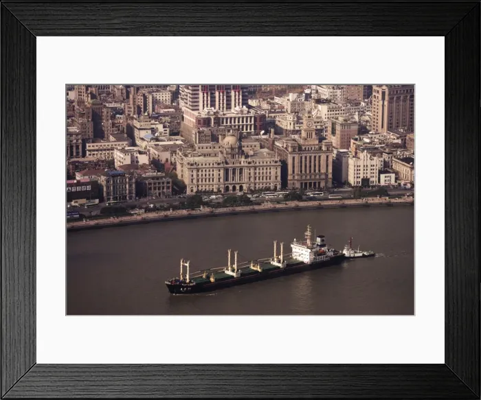 Framed Print : Bund and cargo ship on the Huangpu River, Shanghai, China, Asia Framed Print : Bund and cargo ship on the Huangpu River, Shanghai, China, Asia