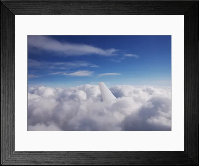 Framed Print : Aircraft tail fin in clouds Framed Print : Aircraft tail fin in clouds