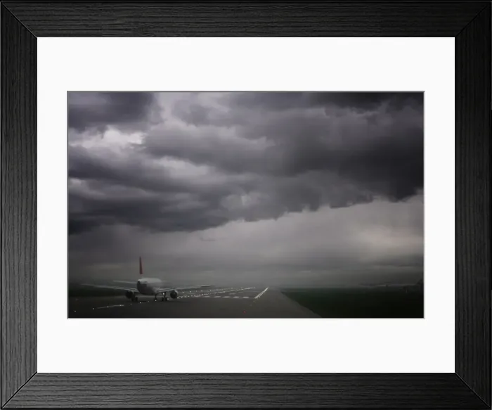 Framed Print : Plane ready for take off and stormy skies, Heathrow Airport, London, England Framed Print : Plane ready for take off and stormy skies, Heathrow Airport, London, England