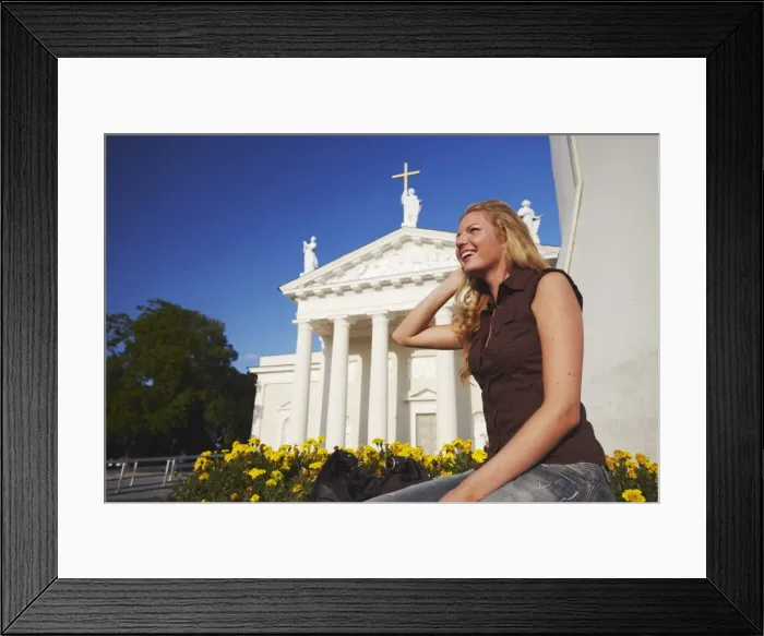 Framed Print : Woman sitting outside Vilnius Cathedral, Vilnius, Lithuania, Baltic States, Europe Framed Print : Woman sitting outside Vilnius Cathedral, Vilnius, Lithuania, Baltic States, Europe