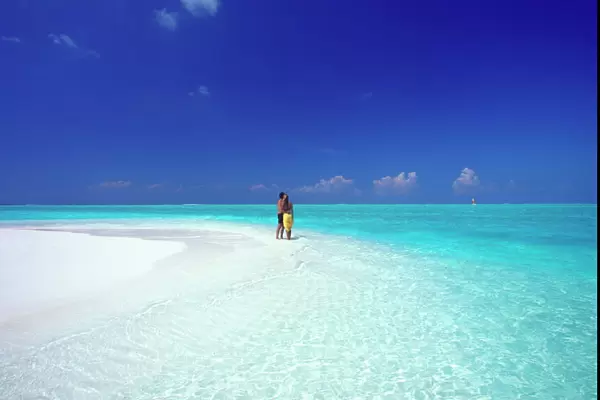 Couple at the beach, Baa atoll, Maldives, Indian Ocean, Asia