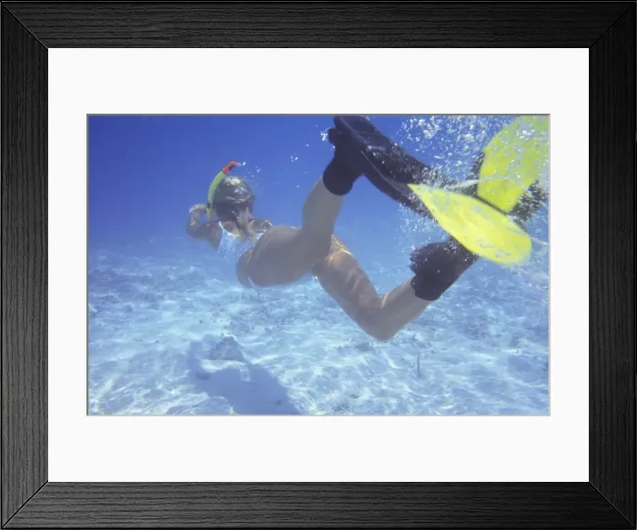 Framed Print : Woman snorkeling in The Maldives, Indian Ocean, Asia