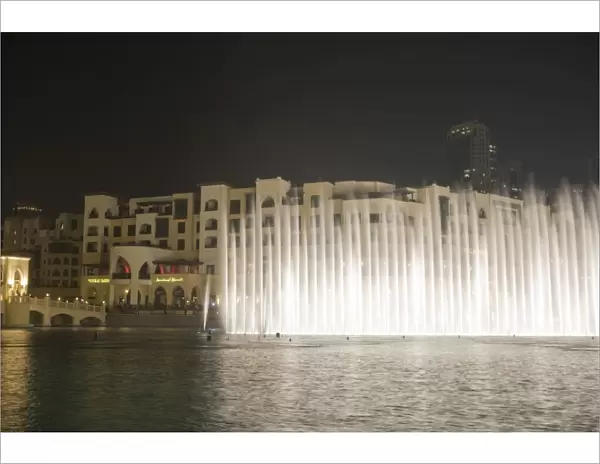 The Dubai Fountain, the largest of its kind in the world that shoots water 150 metres into the air to accompanying music and light show and stands in front of the Burj Khalifa, formerly the Burj Dubai, Downtown Burj Dubai, United Arab Emirates