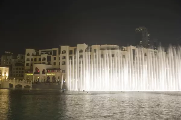 The Dubai Fountain, the largest of its kind in the world that shoots water 150 metres into the air to accompanying music and light show and stands in front of the Burj Khalifa, formerly the Burj Dubai, Downtown Burj Dubai, United Arab Emirates