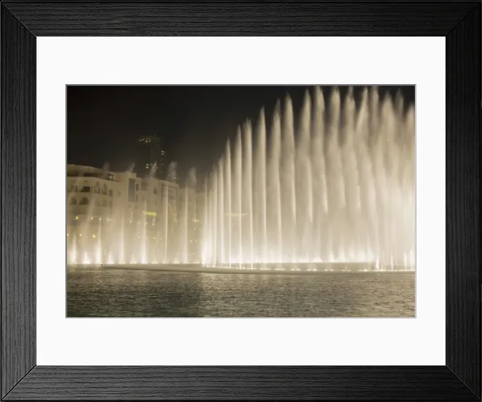 Framed Print : The Dubai Fountain, the largest of its kind in the world that shoots water 150 metres into the air to accompanying music and light show and stands in front of the Burj Khalifa, formerly the Burj Dubai, Downtown Burj Dubai, United Arab Emirates Framed Print : The Dubai Fountain, the largest of its kind in the world that shoots water 150 metres into the air to accompanying music and light show and stands in front of the Burj Khalifa, formerly the Burj Dubai, Downtown Burj Dubai, United Arab Emirates