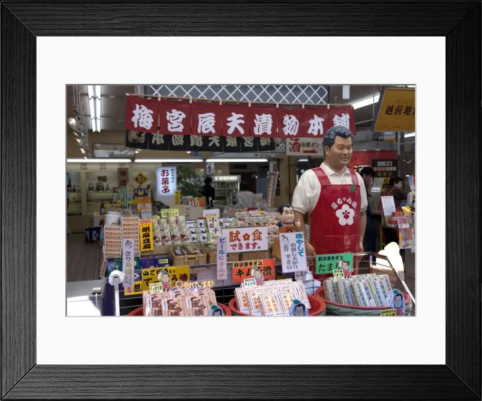 Framed Print : Mannequin of famous Japanese TV personality selling his food products called Tat-chan Zuke at gift shop