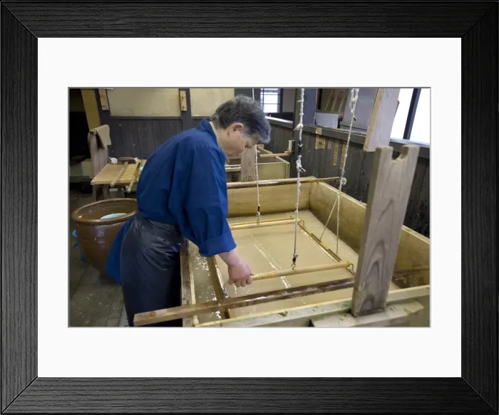 Framed Print : Making traditional Japanese washi paper at Echizen Washi No Sato village in Fukui Framed Print : Making traditional Japanese washi paper at Echizen Washi No Sato village in Fukui