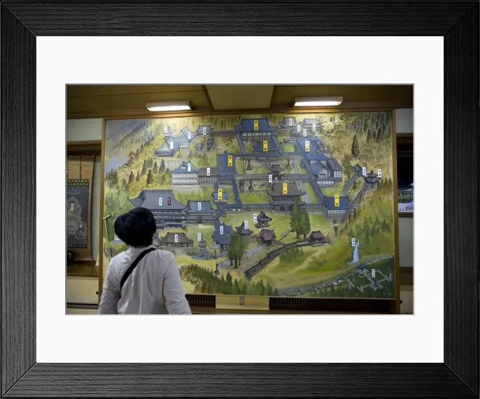 Framed Print : Woman viewing map of Eiheiji Temple, headquarters of Soto sect of Zen Buddhism