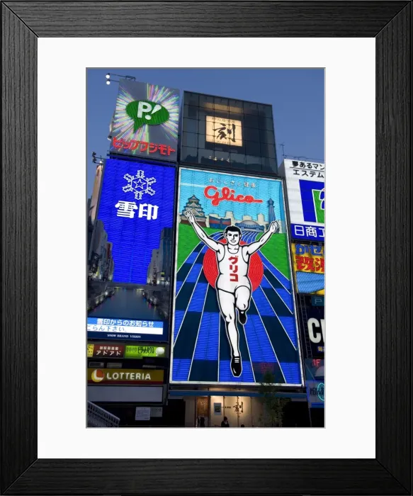 Framed Print : Famous neon wall with Glico runner advert in Dotonbori district of Namba Framed Print : Famous neon wall with Glico runner advert in Dotonbori district of Namba