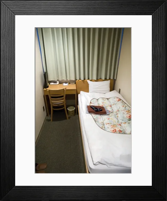 Framed Print : A shoebox-sized hotel room less than two metres wide and costing 8, 000 Yen ($80 Framed Print : A shoebox-sized hotel room less than two metres wide and costing 8, 000 Yen ($80
