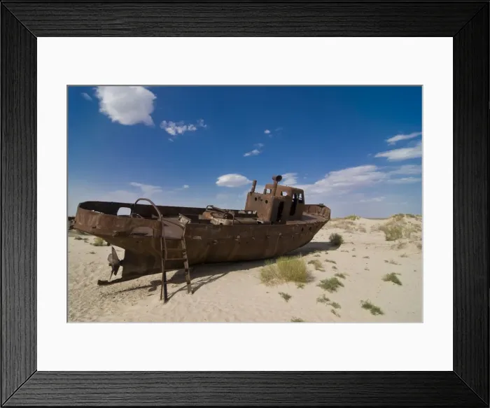 Framed Print : Rusting boats lying in the desert which used to be the Aral Sea, Moynaq Framed Print : Rusting boats lying in the desert which used to be the Aral Sea, Moynaq