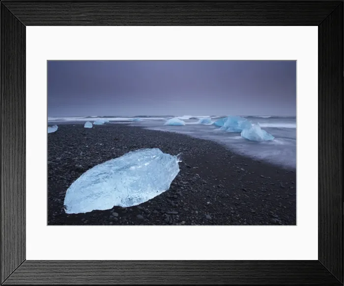 Framed Print : Iceberg washed ashore on Breidamerkursandur black sands, near Jokulsarlon glacial lagoon