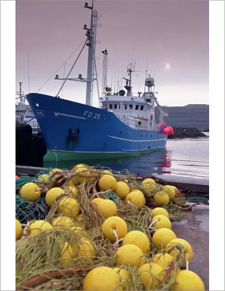 Trawler and fishing nets in Toftir harbour, Toftir, Eysturoy, Faroe Islands (Faroes)