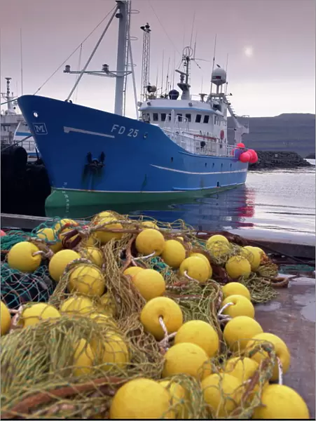 Trawler and fishing nets in Toftir harbour, Toftir, Eysturoy, Faroe Islands (Faroes)