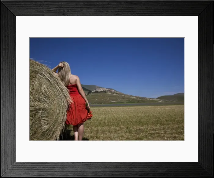 Framed Print : Woman in a field, Castelluccio di Norcia, Norcia, Umbria, Italy, Europe Framed Print : Woman in a field, Castelluccio di Norcia, Norcia, Umbria, Italy, Europe