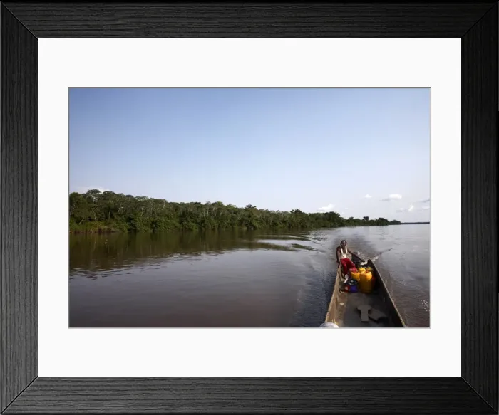 Framed Print : A dugout canoe on the Congo River, Democratic Republic of Congo, Africa Framed Print : A dugout canoe on the Congo River, Democratic Republic of Congo, Africa